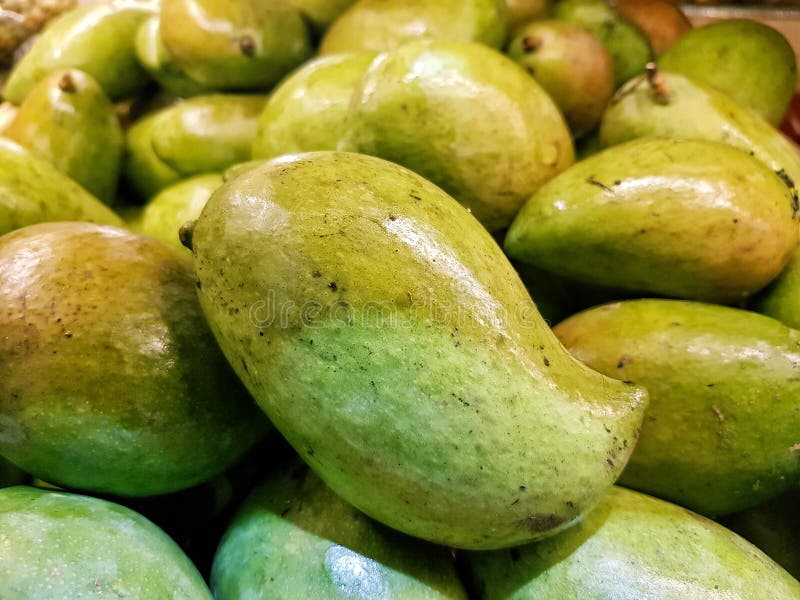 Closeup shot of mangoes sold at a local grocer store in Africa. Closeup shot of mangoes sold at a local grocer store in Africa