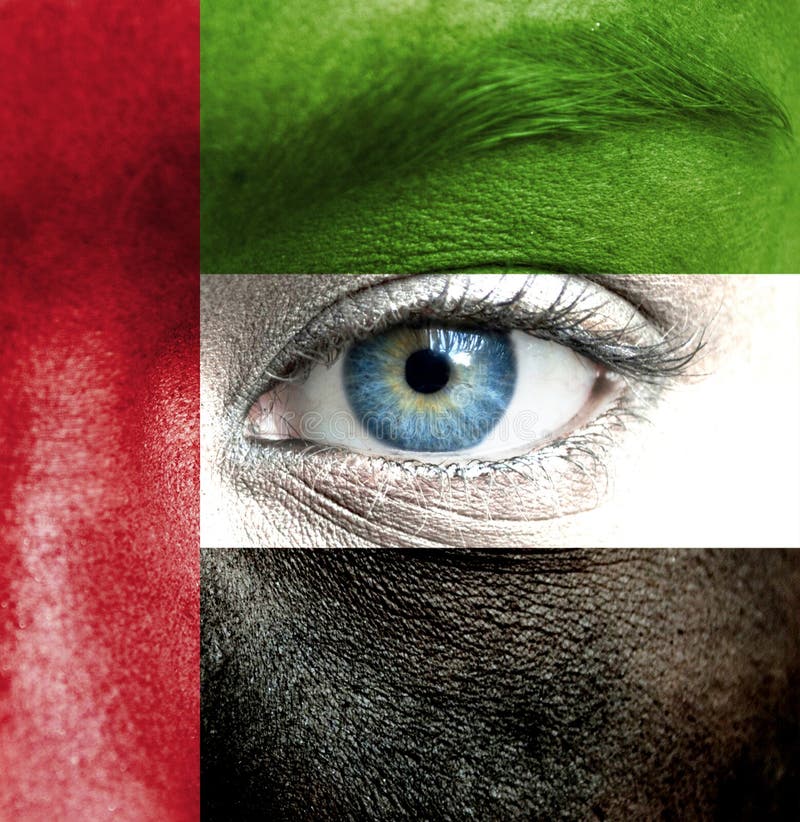 Visage humain peint avec le drapeau des Emirats Arabes Unis photos stock Visage humain peint avec le drapeau des Emirats Arabes Unis photos stock