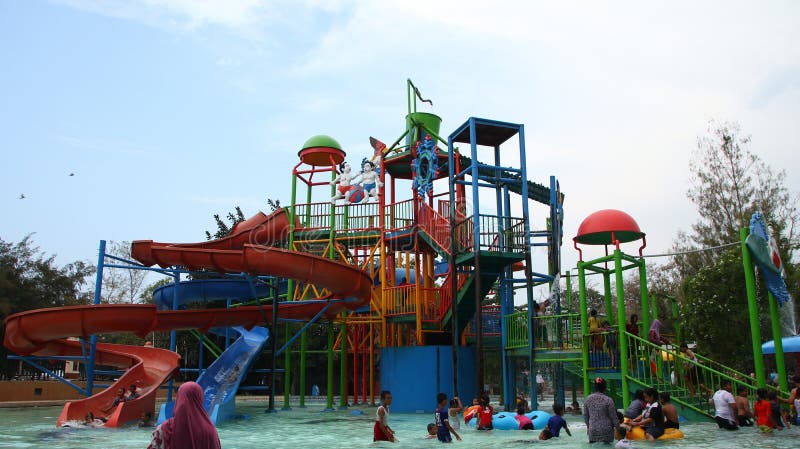 Visitors of the Amusement Park Play, while Enjoying the Pool of Water ...