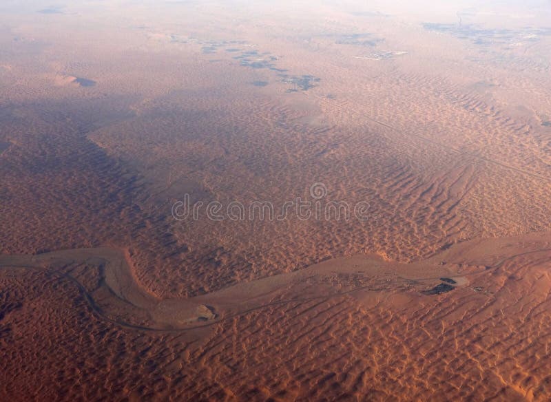 Aerial view showing the desert of dubai, a emirate within the United Arab Emirates. Aerial view showing the desert of dubai, a emirate within the United Arab Emirates