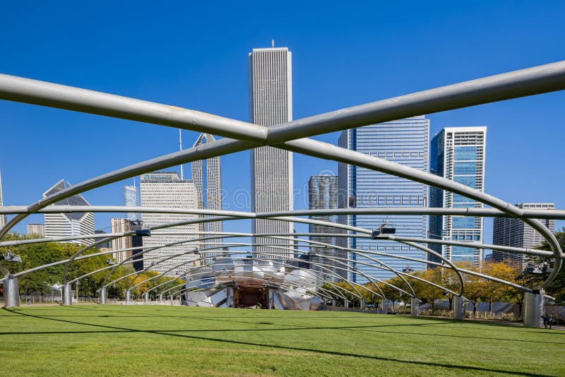 Chicago, OCT 3 2023 - Sunny view of the Jay Pritzker Pavilion at Millennium Park. Chicago, OCT 3 2023 - Sunny view of the Jay Pritzker Pavilion at Millennium Park