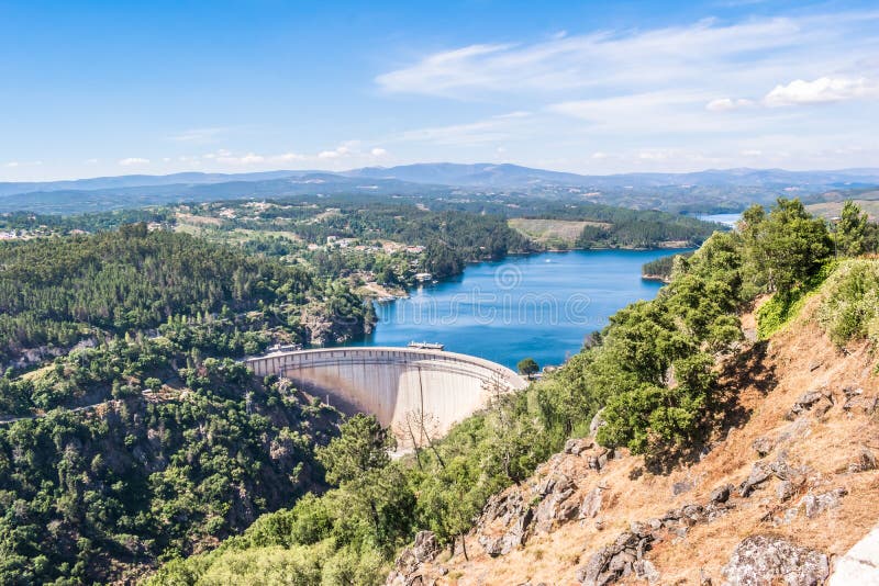 Fantastic panoramic and aerial view over the Cabril dam in Pedrogão Grande. The largest dam construction in Portugal, reservoir of waters of the river Zêzere. Landscape of natural beauty of great beauty where the famous N2 passes. Fantastic panoramic and aerial view over the Cabril dam in Pedrogão Grande. The largest dam construction in Portugal, reservoir of waters of the river Zêzere. Landscape of natural beauty of great beauty where the famous N2 passes.