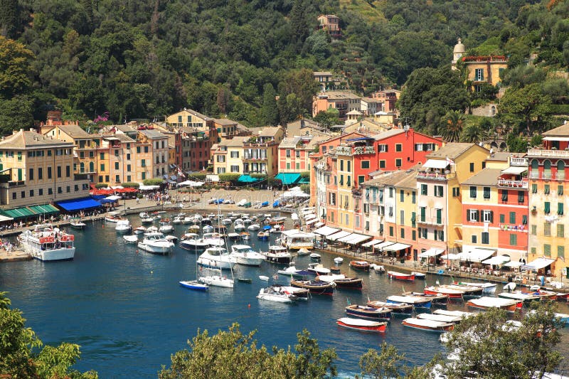 Aerial view on small harbour and Portofino - small town on Ligurian sea in northern Italy. Aerial view on small harbour and Portofino - small town on Ligurian sea in northern Italy.