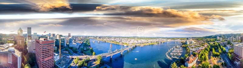 Panoramic aerial view of Portland skyline and Willamette river. Panoramic aerial view of Portland skyline and Willamette river.