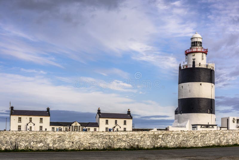 Vista cênico do farol do gancho, condado Wexford, Irlanda fotografia de stock royalty free Vista cênico do farol do gancho, condado Wexford, Irlanda fotografia de stock royalty free