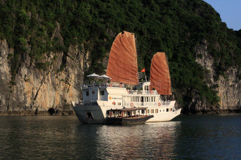 Ha Long Bay, in northeast Vietnam, is known for its emerald waters and thousands of towering limestone islands topped by rainforests. Junk boat tours and sea kayak expeditions take visitors past islands named for their shapes, including Stone Dog and Teapot islets. The region is popular for scuba diving, rock climbing and hiking, particularly in mountainous Cat Ba National Park. Ha Long Bay, in northeast Vietnam, is known for its emerald waters and thousands of towering limestone islands topped by rainforests. Junk boat tours and sea kayak expeditions take visitors past islands named for their shapes, including Stone Dog and Teapot islets. The region is popular for scuba diving, rock climbing and hiking, particularly in mountainous Cat Ba National Park.