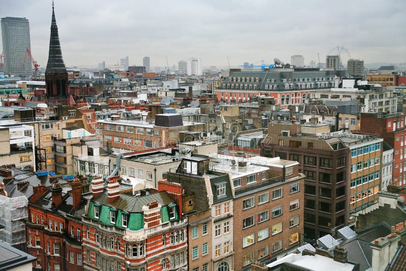 View on London houses and roofs in winter cloudy day. View on London houses and roofs in winter cloudy day