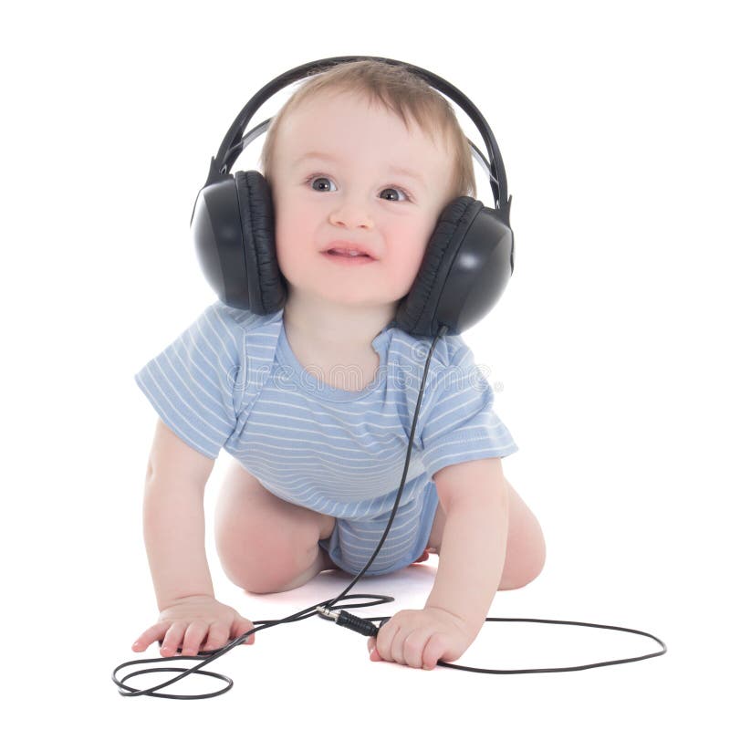 Vista laterale del bambino del neonato con le cuffie isolate su bianco fotografia stock libera da diritti
