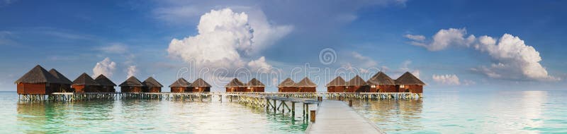 Panoramic view on water villas at tropical resort. Panoramic view on water villas at tropical resort