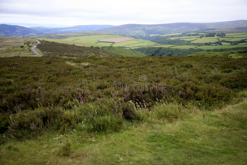 Vista sobre o monte de Porlock, Exmoor imagem de stock royalty free Vista sobre o monte de Porlock, Exmoor imagem de stock royalty free
