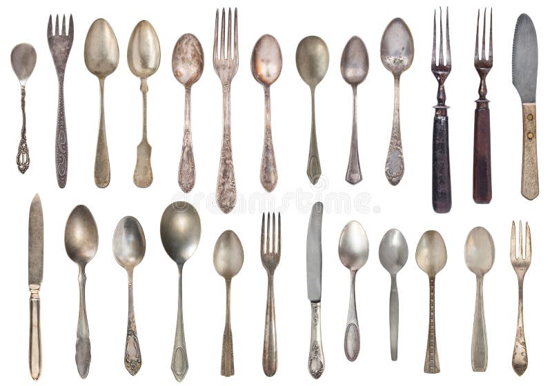 Vista superiore di bei coltelli, cucchiai e delle forchette d'argento d'annata isolati su fondo bianco silverware fotografia stock libera da diritti Vista superiore di bei coltelli, cucchiai e delle forchette d'argento d'annata isolati su fondo bianco silverware fotografia stock libera da diritti
