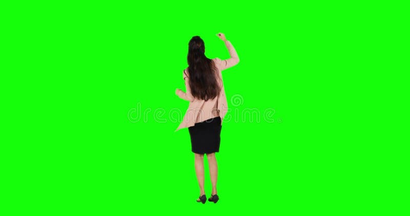 Vista trasera del baile de la mujer de negocios en estudio almacen de metraje de vídeo