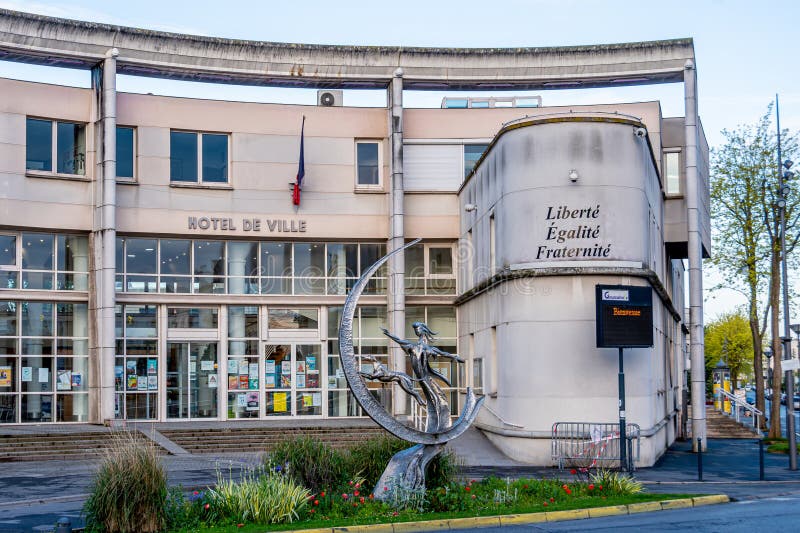 Goussainville, France - May 3, 2024: Exterior view of the town hall of Goussainville, a French commune located in the department of Val-d'Oise, in the Ile-de-France region, northeast of Paris. Goussainville, France - May 3, 2024: Exterior view of the town hall of Goussainville, a French commune located in the department of Val-d'Oise, in the Ile-de-France region, northeast of Paris