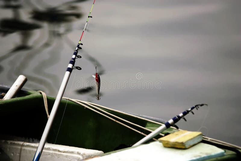 Fishing lure on stick by the sea. Fishing lure on stick by the sea