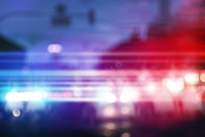 Blurred view of police cars on street at night. Blurred view of police cars on street at night
