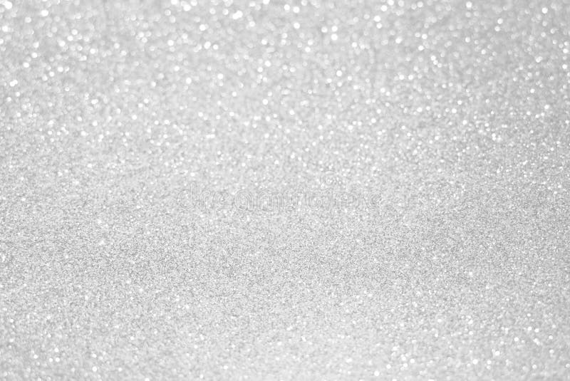 Vit silver blänker bokehtextur arkivfoto Vit silver blänker bokehtextur arkivfoto