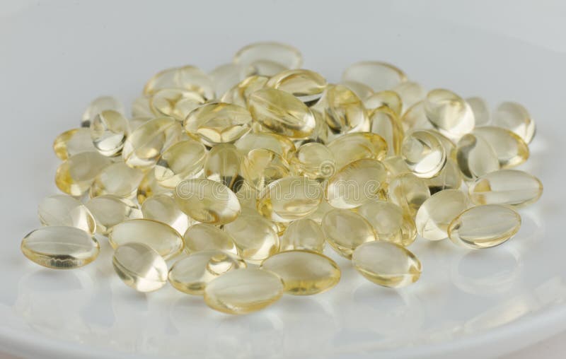 Vitamin D3 in Yellow Capsules Stock Photo Image of care, medical