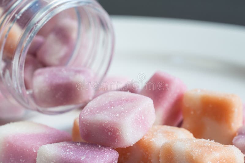 Close-up view of gummy with calcium and vitamins for daily dietary supplement. Close-up view of gummy with calcium and vitamins for daily dietary supplement.