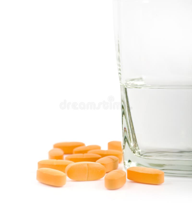 Vitamines avec la glace de l'eau photographie stock libre de droits Vitamines avec la glace de l'eau photographie stock libre de droits
