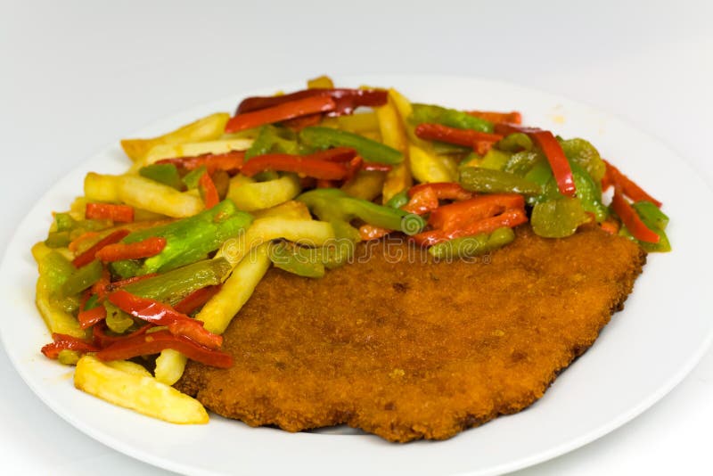 Vitela panada fritada original vienense (poderia ser o eit foto de stock royalty free Vitela panada fritada original vienense (poderia ser o eit foto de stock royalty free