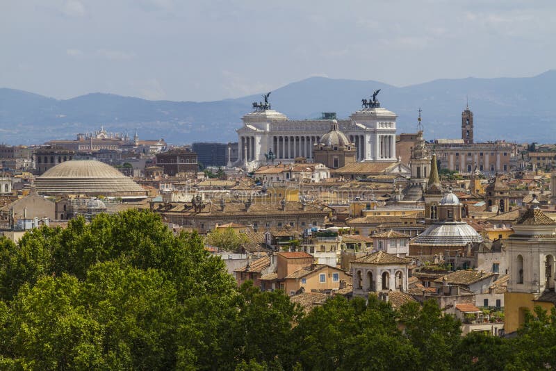 Vittorio Emanuele Monument and Churches Domes in Rome. Stock Photo