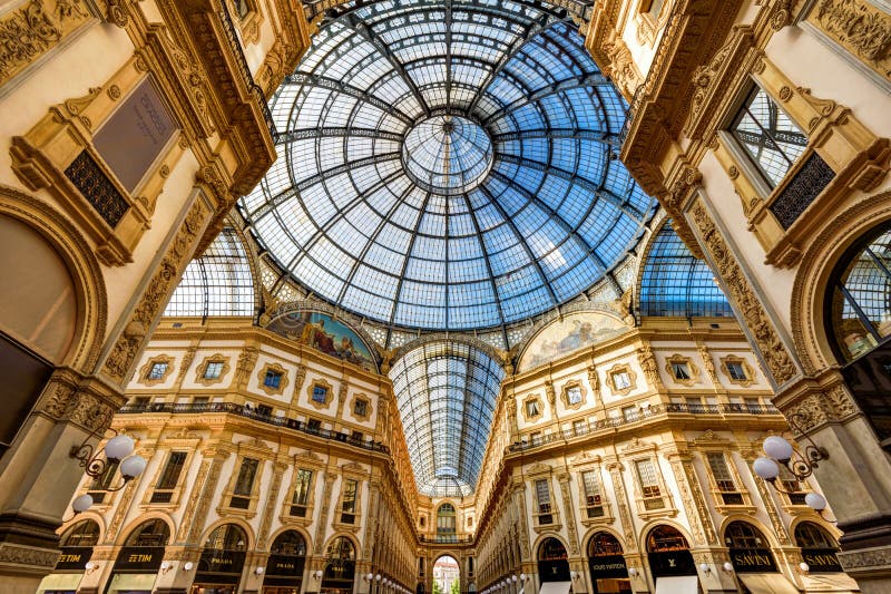 MILAN, ITALY - MAY 16, 2017: The Galleria Vittorio Emanuele II on the Piazza del Duomo in central Milan. This gallery is one of the world`s oldest shopping malls. MILAN, ITALY - MAY 16, 2017: The Galleria Vittorio Emanuele II on the Piazza del Duomo in central Milan. This gallery is one of the world`s oldest shopping malls.