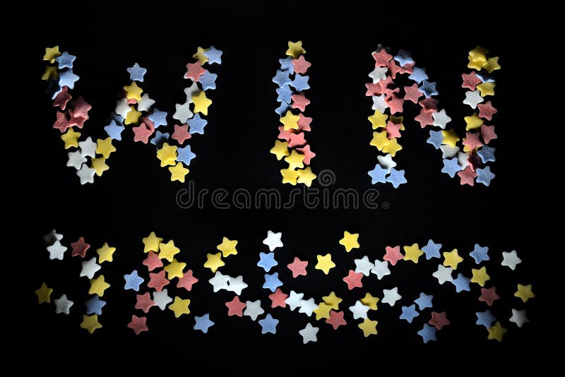 Vitória da palavra de Thw no amarelo branco vermelho e nas estrelas azuis do açúcar, para o negócio, treinando, fãs de esportes, fotografia de stock Vitória da palavra de Thw no amarelo branco vermelho e nas estrelas azuis do açúcar, para o negócio, treinando, fãs de esportes, fotografia de stock