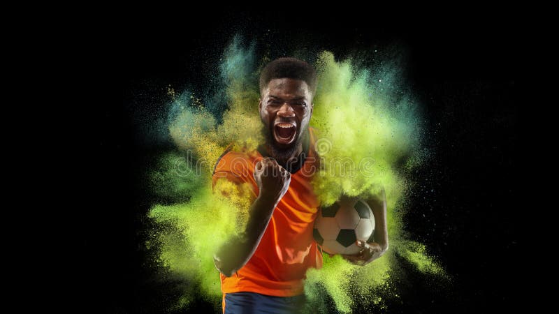 Collage with young sportsman, soccer football player in explosion of colored neon powder isolated on dark background