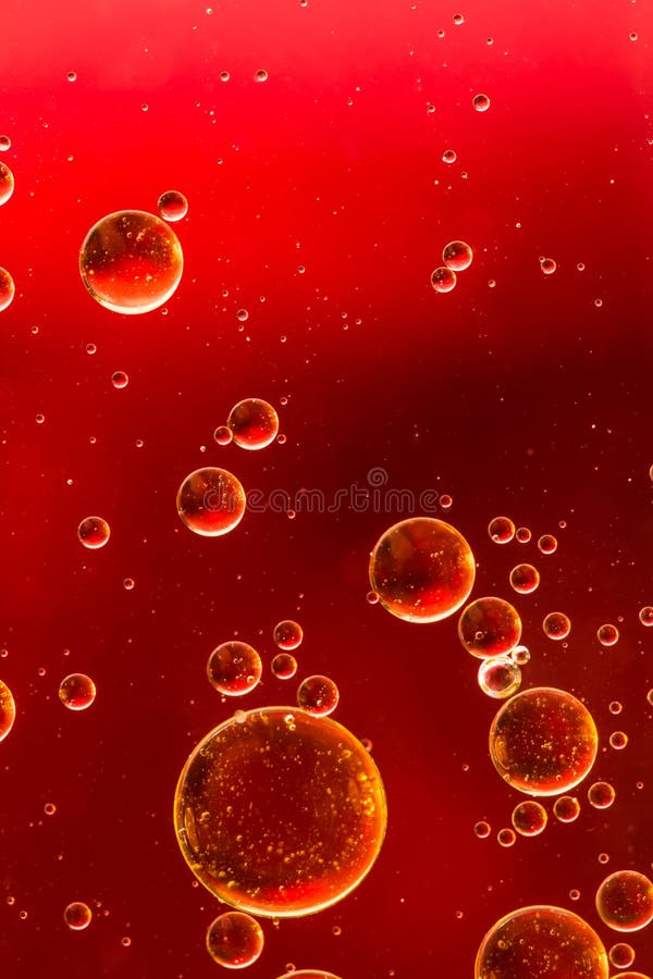 Vivid red and gold oil and water abstract royalty free stock photo