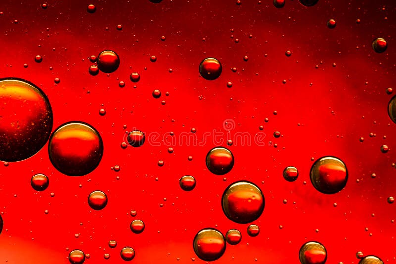 Vivid red and gold oil and water abstract royalty free stock photography