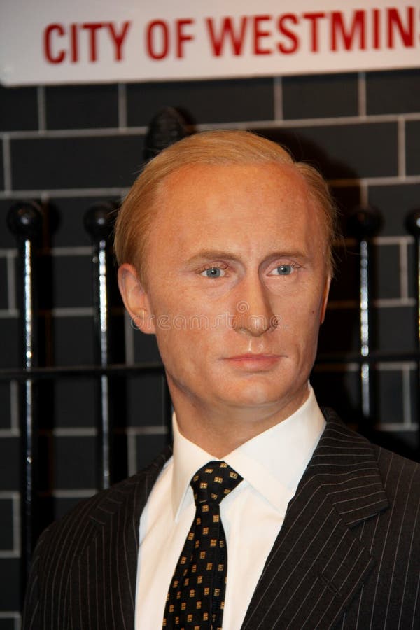 London, - United Kingdom, 08, July 2014. Madame Tussauds in London. Waxwork statue of Vladimir Putin . Created by Madam Tussauds in 1884. Madam Tussauds is a waxwork museum and tourist attraction exhibiting celebrity life size wax statues. This museum allows people to touch and to be photographed with the waxwork statues. Photo taken on: 8th July, 2014