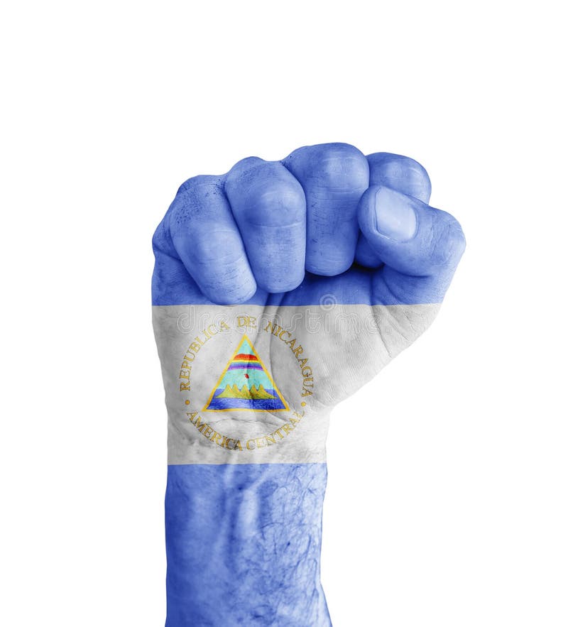 Vlag van Nicaragua op menselijke vuist zoals overwinningssymbool dat wordt geschilderd stock fotografie Vlag van Nicaragua op menselijke vuist zoals overwinningssymbool dat wordt geschilderd stock fotografie