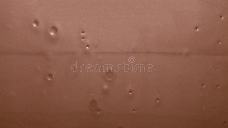 Vlotte textuur van melkchocola stock fotografie