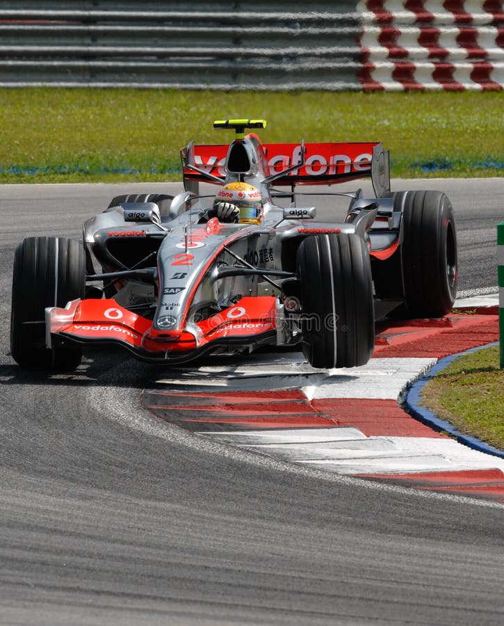 Lewis Hamilton lifts the tyre while negotiating a turn at Sepang F1 Malaysia 2007 Grand Prix. Lewis Hamilton lifts the tyre while negotiating a turn at Sepang F1 Malaysia 2007 Grand Prix