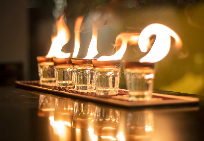 Vodka Fire Shots Lined Up on a Table in a Bar Stock Photo Image of
