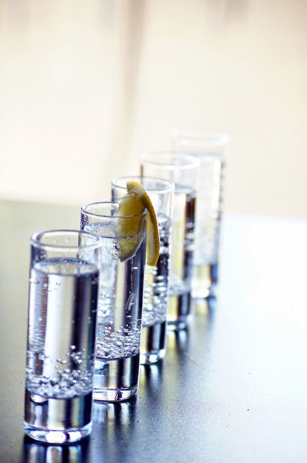 Vodka glasses stock image. Image of juicy, background 21273197