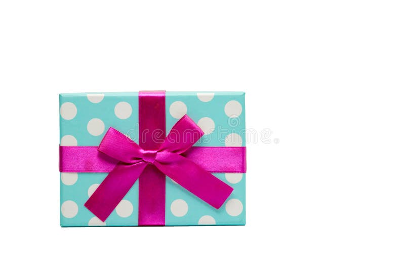 Voegt het polka gestippelde giftvakje met roze die lintboog op witte achtergrond wordt geïsoleerd, enkel uw eigen tekst toe Gebru stock fotografie Voegt het polka gestippelde giftvakje met roze die lintboog op witte achtergrond wordt geïsoleerd, enkel uw eigen tekst toe Gebru stock fotografie