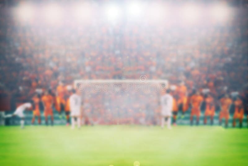 Voetbal en voetbalstadion voor kampioenschapswinst voor Onscherpe rug stock fotografie Voetbal en voetbalstadion voor kampioenschapswinst voor Onscherpe rug stock fotografie