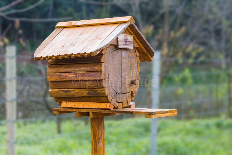 Birdhouse or homemade wooden mailbox with clipping path. Birdhouse or homemade wooden mailbox with clipping path