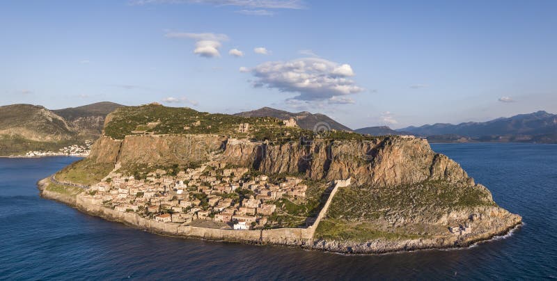 Aerial view of the ancient hillside town of Monemvasia located in the southeastern part of the Peloponnese peninsula, Greece. Aerial view of the ancient hillside town of Monemvasia located in the southeastern part of the Peloponnese peninsula, Greece