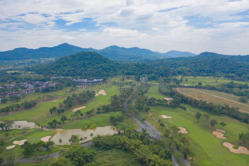 Aerial view of Golf Course Club and hotel resort. Green natural garden park in sport and recreation concept. Aerial view of Golf Course Club and hotel resort. Green natural garden park in sport and recreation concept.