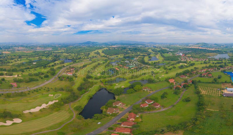 Aerial view of Golf Course Club and hotel resort. Green natural garden park in sport and recreation concept. Aerial view of Golf Course Club and hotel resort. Green natural garden park in sport and recreation concept.