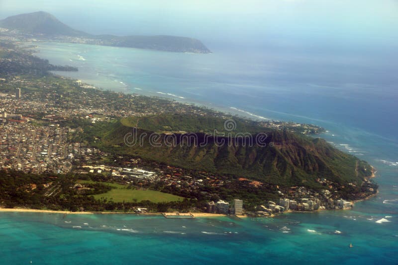 Aerial view of Diamondhead, Kapiolani Park, Waikiki, Natatorium, Kapahulu town, Pacific ocean, clouds, and on Oahu, Hawaii. Aerial view of Diamondhead, Kapiolani Park, Waikiki, Natatorium, Kapahulu town, Pacific ocean, clouds, and on Oahu, Hawaii.