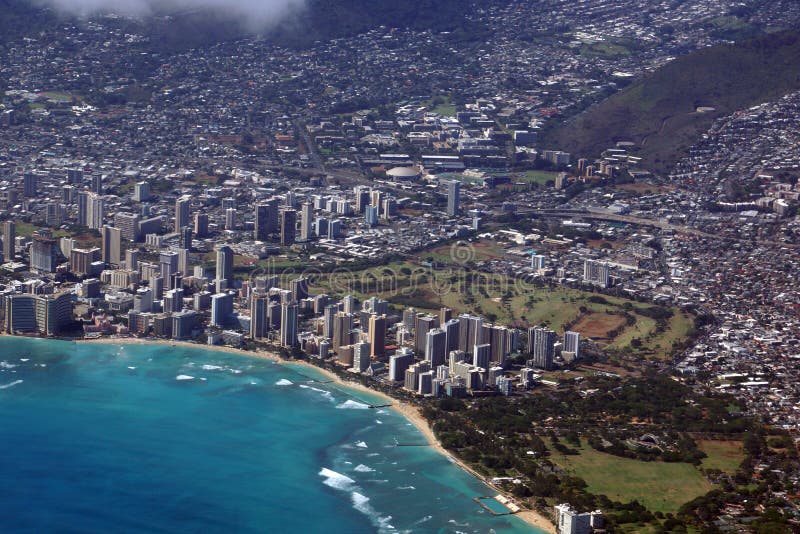 Aerial view of Diamondhead, Kapiolani Park, Waikiki, Shell, Ala Wai Canal, Kapahulu town, Highway, Pacific ocean, clouds, and Ala Wai Golf Course on Oahu, Hawaii. June 2015. Aerial view of Diamondhead, Kapiolani Park, Waikiki, Shell, Ala Wai Canal, Kapahulu town, Highway, Pacific ocean, clouds, and Ala Wai Golf Course on Oahu, Hawaii. June 2015.