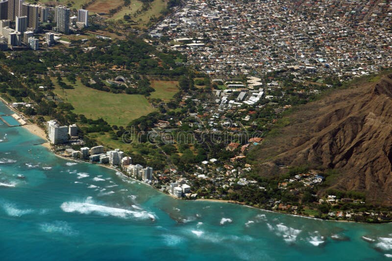 Aerial view of Diamondhead, Kapiolani Park, Waikiki, Shell, Kapahulu town, Pacific ocean, waves, and Ala Wai Golf Course on Oahu, Hawaii. June 2015. Aerial view of Diamondhead, Kapiolani Park, Waikiki, Shell, Kapahulu town, Pacific ocean, waves, and Ala Wai Golf Course on Oahu, Hawaii. June 2015.