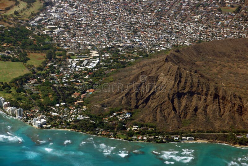 Aerial view of Diamondhead, Kapiolani Park, Waikiki, Shell, Kapahulu town, homes, Pacific ocean, waves, and Ala Wai Golf Course on Oahu, Hawaii. June 2015. Aerial view of Diamondhead, Kapiolani Park, Waikiki, Shell, Kapahulu town, homes, Pacific ocean, waves, and Ala Wai Golf Course on Oahu, Hawaii. June 2015.