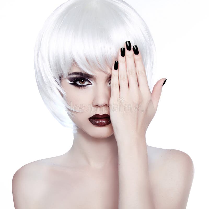 Vogue Style Woman. Fashion Beauty Woman Portrait with White Short Hair. Hairstyle. Manicured polish nails. royalty free stock photo Vogue Style Woman. Fashion Beauty Woman Portrait with White Short Hair. Hairstyle. Manicured polish nails. royalty free stock photo