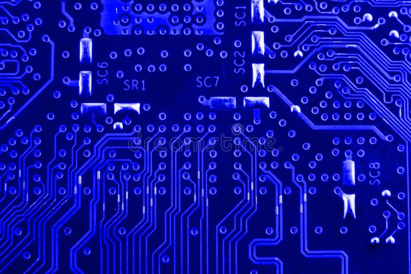 Voies conductrices sur la carte mère du macro de fin de carte électronique photographie stock libre de droits Voies conductrices sur la carte mère du macro de fin de carte électronique photographie stock libre de droits