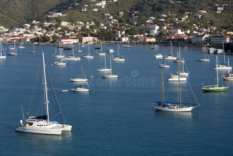 Numerous sailboats are moored in harbor at St Thomas, US Virgin Islands. Numerous sailboats are moored in harbor at St Thomas, US Virgin Islands.