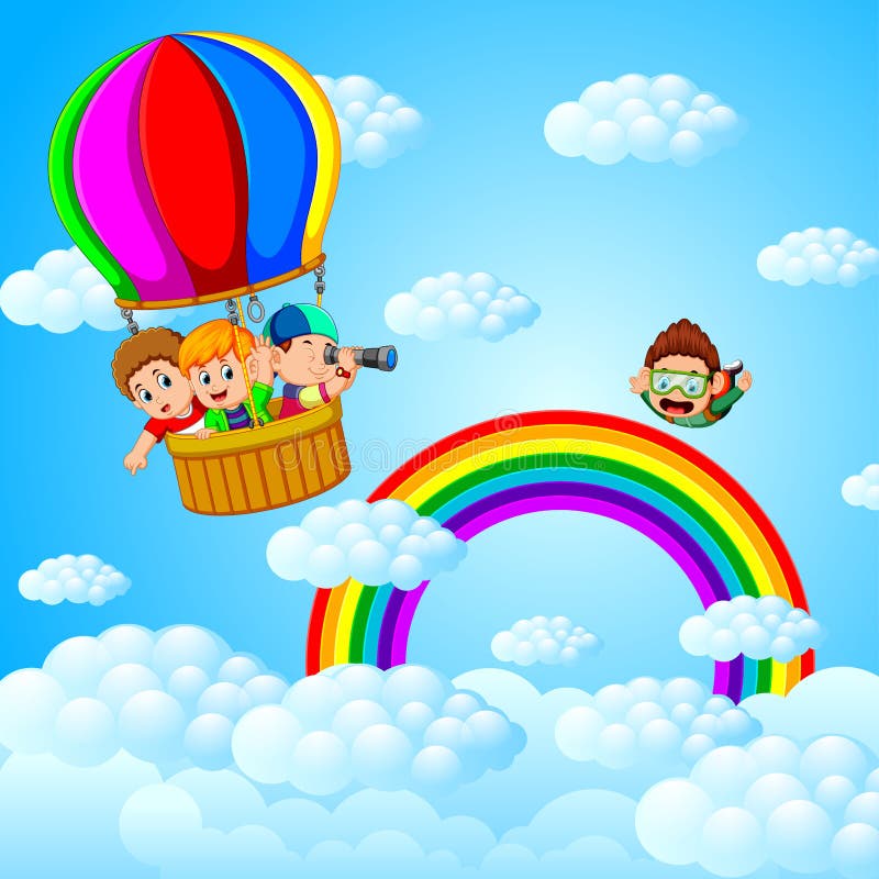 Vol heureux d'enfants dans un ballon à air et un parachutiste chaud
